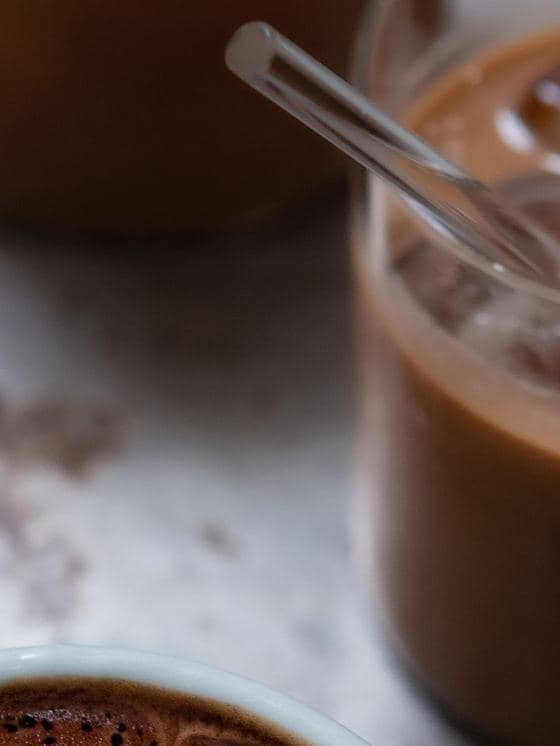 An iced coffee photographed close-up at a Malaysian cafe